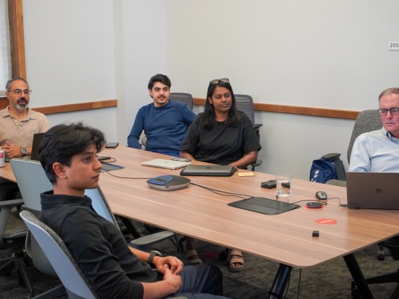 Mentor in Residence, John Achoukian, and student resident entrepreneurs meet with with guest speaker Dr. David Cook, a former practicing physician at the Mayo Clinic and Chief Medical Officer at UnitedHealth Group Ventures LLC