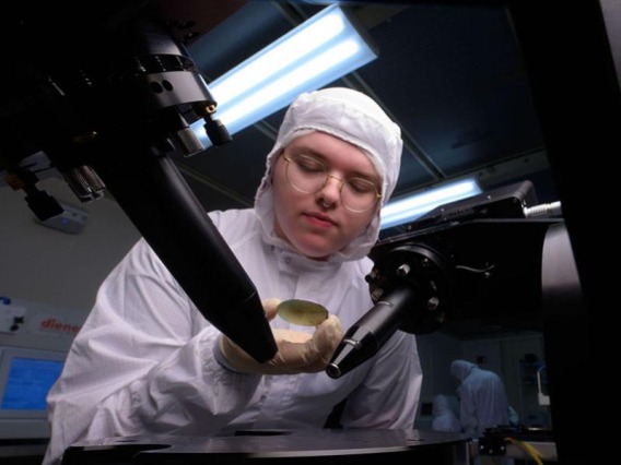Graduate student working in a nano fabrication center