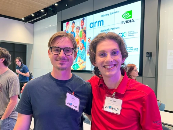 Two AI-HDL students pose together.