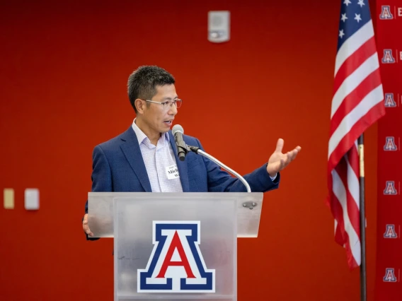 Michael Wu, ECE department head, stands at podium
