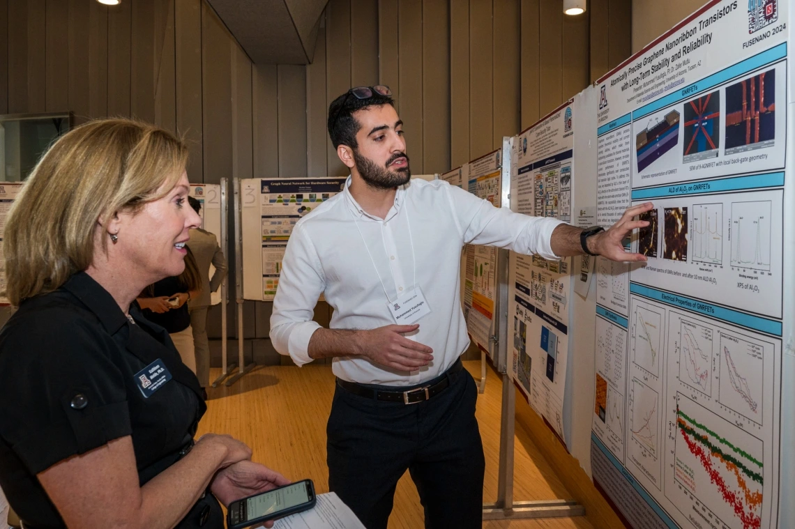 Muhammed Yusufoglu, a graduate student studying materials science and engineering, presents his research at the FuseNano 2024 conference