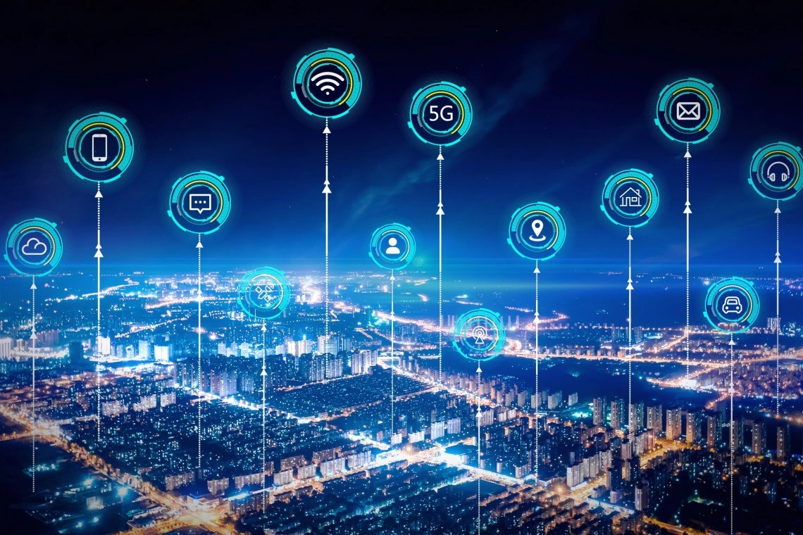 Graphic of city with tech-related icons