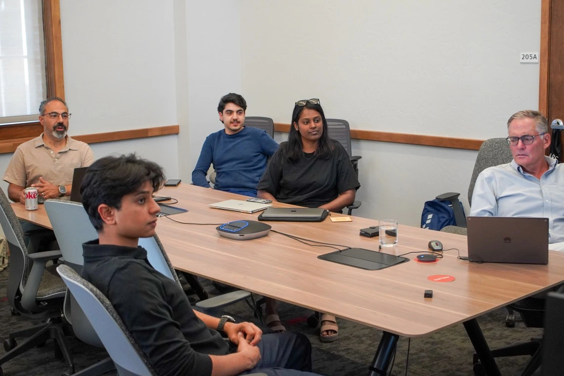 Mentor in Residence, John Achoukian, and student resident entrepreneurs meet with with guest speaker Dr. David Cook, a former practicing physician at the Mayo Clinic and Chief Medical Officer at UnitedHealth Group Ventures LLC