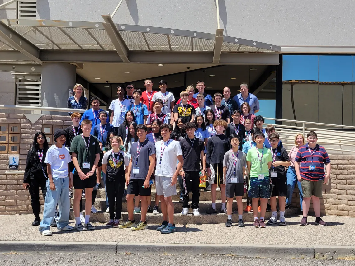 CUSD semiconductor camp student pose during a company visit.