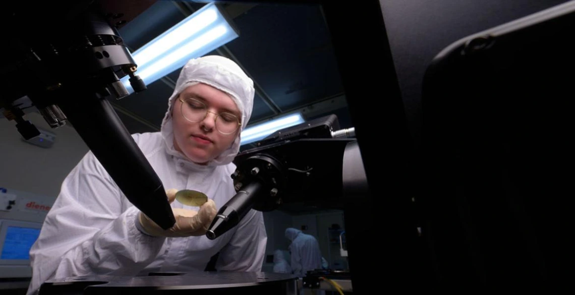 Graduate student working in a nano fabrication center