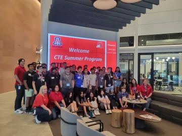 CUSD semiconductor camp students pose inside during a camp field trip.